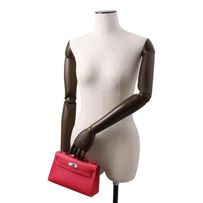 HERMES PochetteKelly Rose Xream Swift Leather