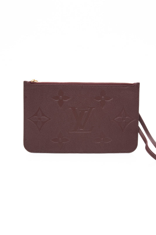 LOUIS VUITTON Wine Monogram Empreinte Leather Wristlet (New)